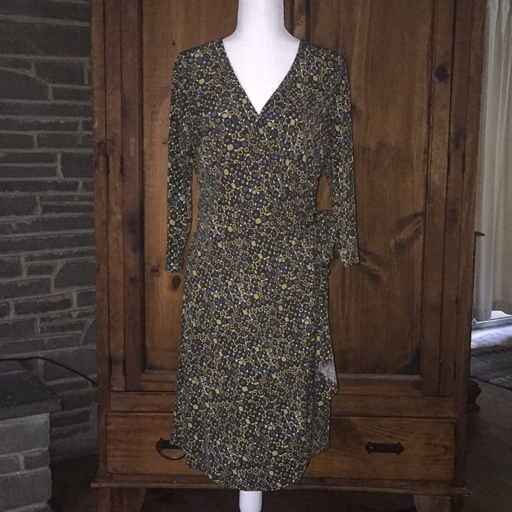B. Moss brown and green patterned wrap dress.